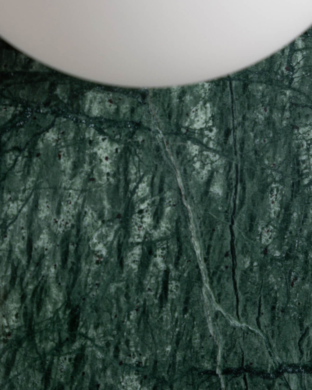Wall light with side sphere in Lunas marble