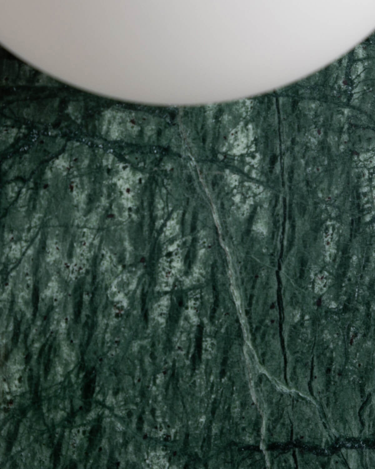 Wall light with side sphere in Lunas marble