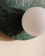Wall light with side sphere in Lunas marble