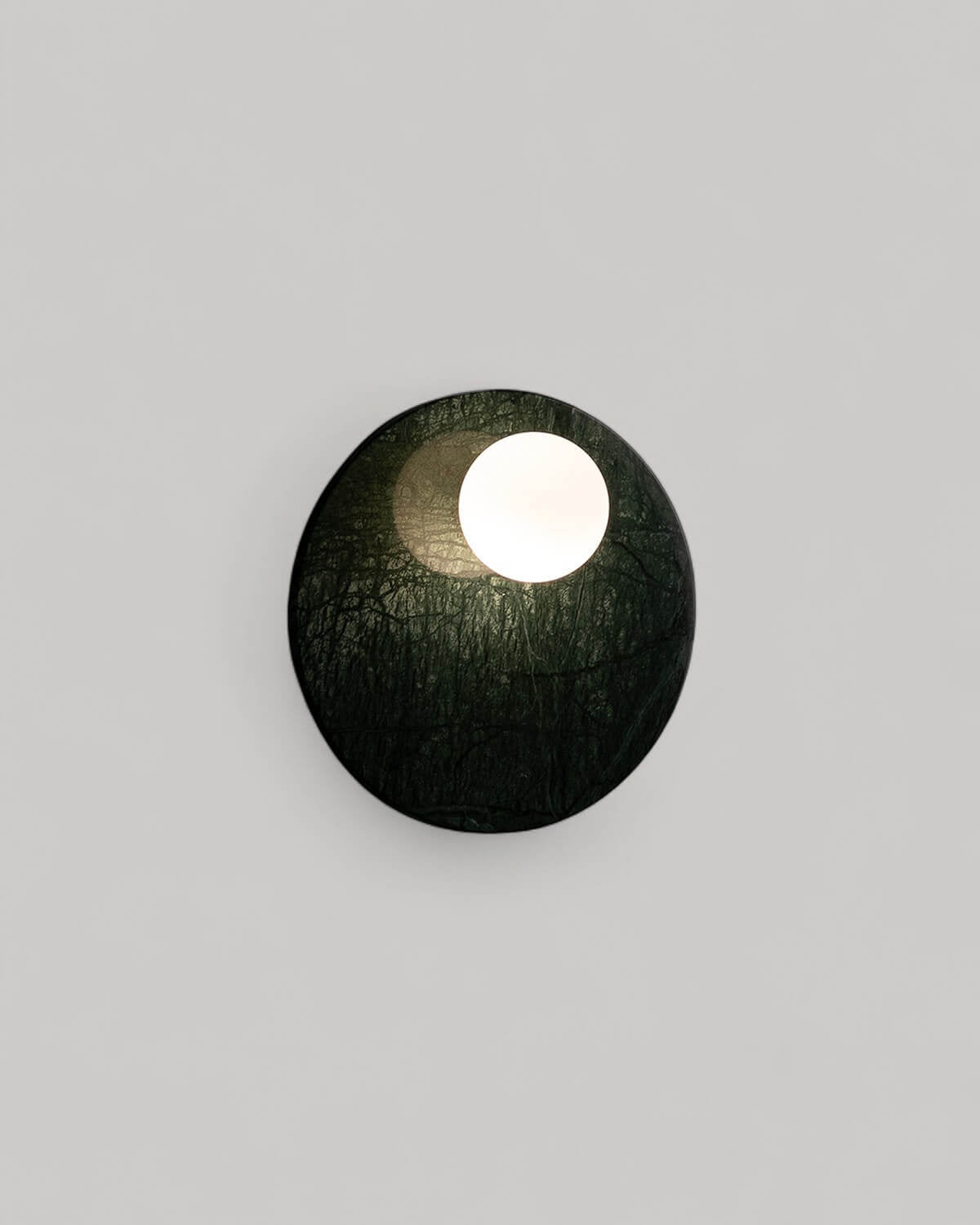 Wall light with side sphere in Lunas marble