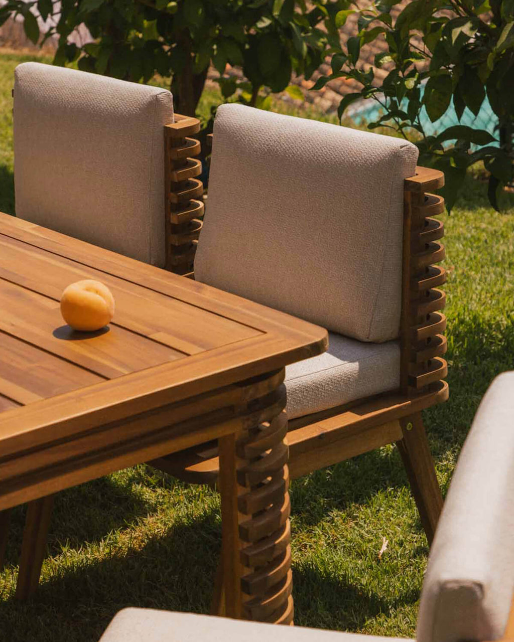 Acacia wood outdoor chair with Hazan fabric cushions
