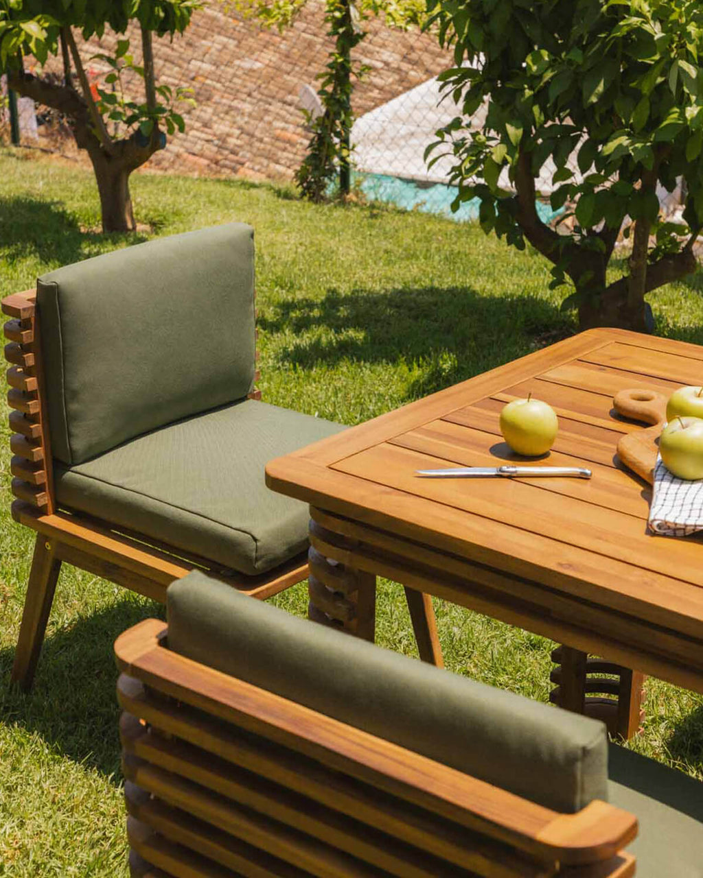 Acacia wood outdoor chair with Hazan fabric cushions