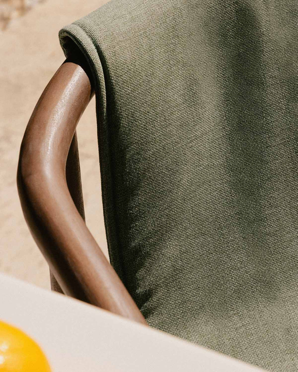 Outdoor chair in eucalyptus wood and Clhoti fabric