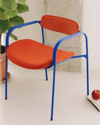 Dining chair with armrests in velvet and Ilan fabric