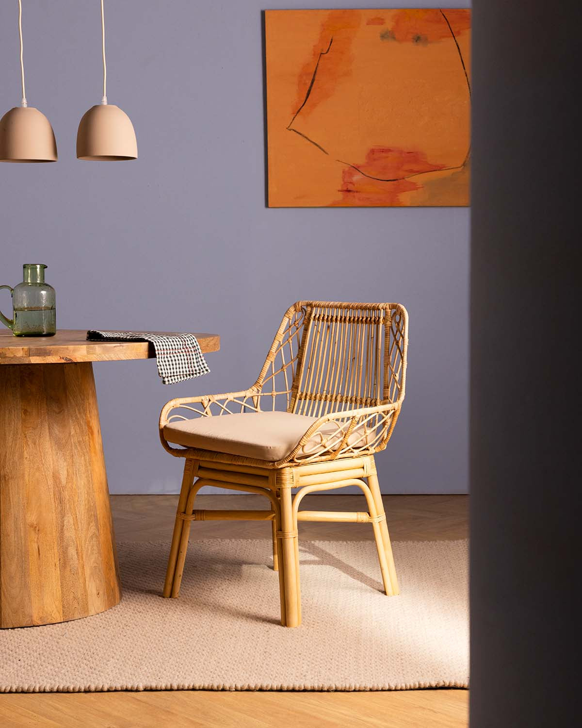 Natural rattan dining chair with Melys cushion