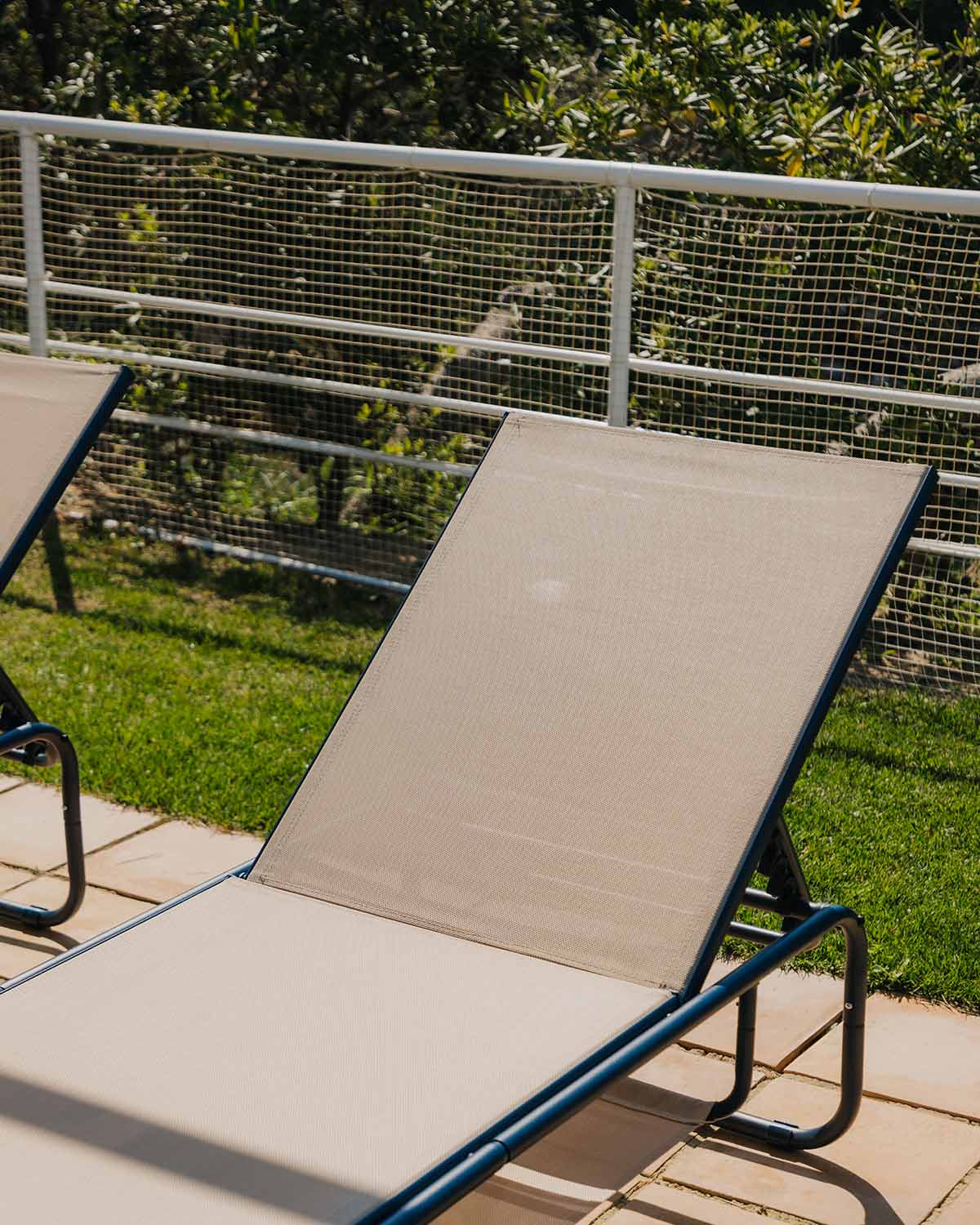 Ohiane metal and fabric reclining sun lounger