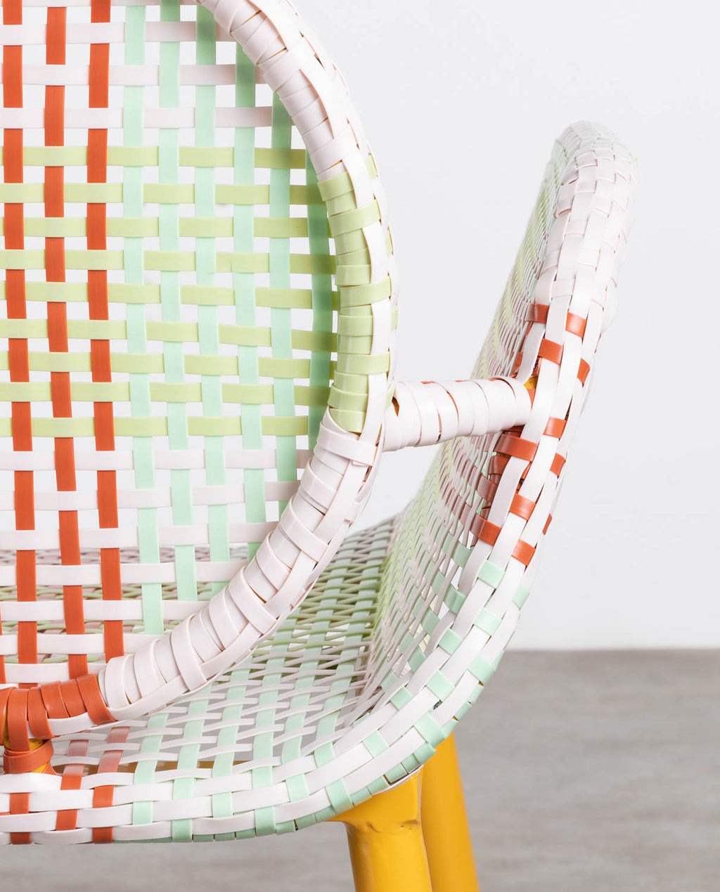 Emba Studio aluminum and synthetic rattan armchair