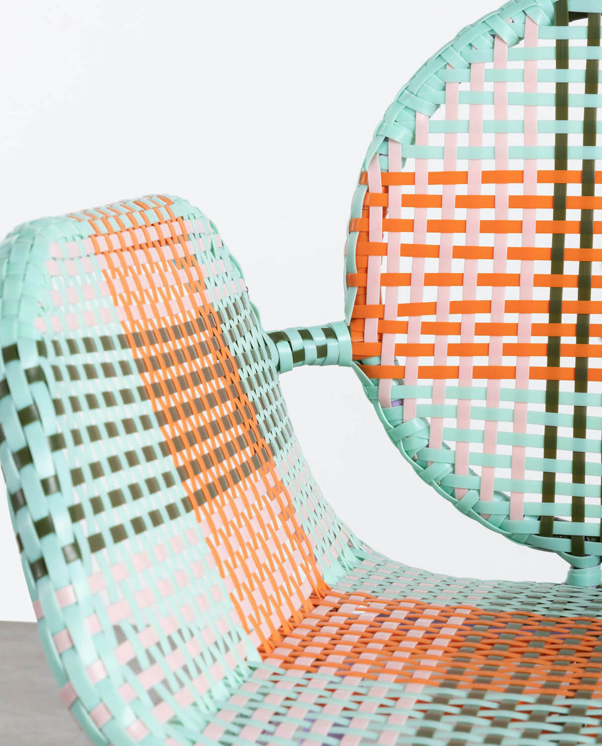 Emba Studio aluminum and synthetic rattan armchair