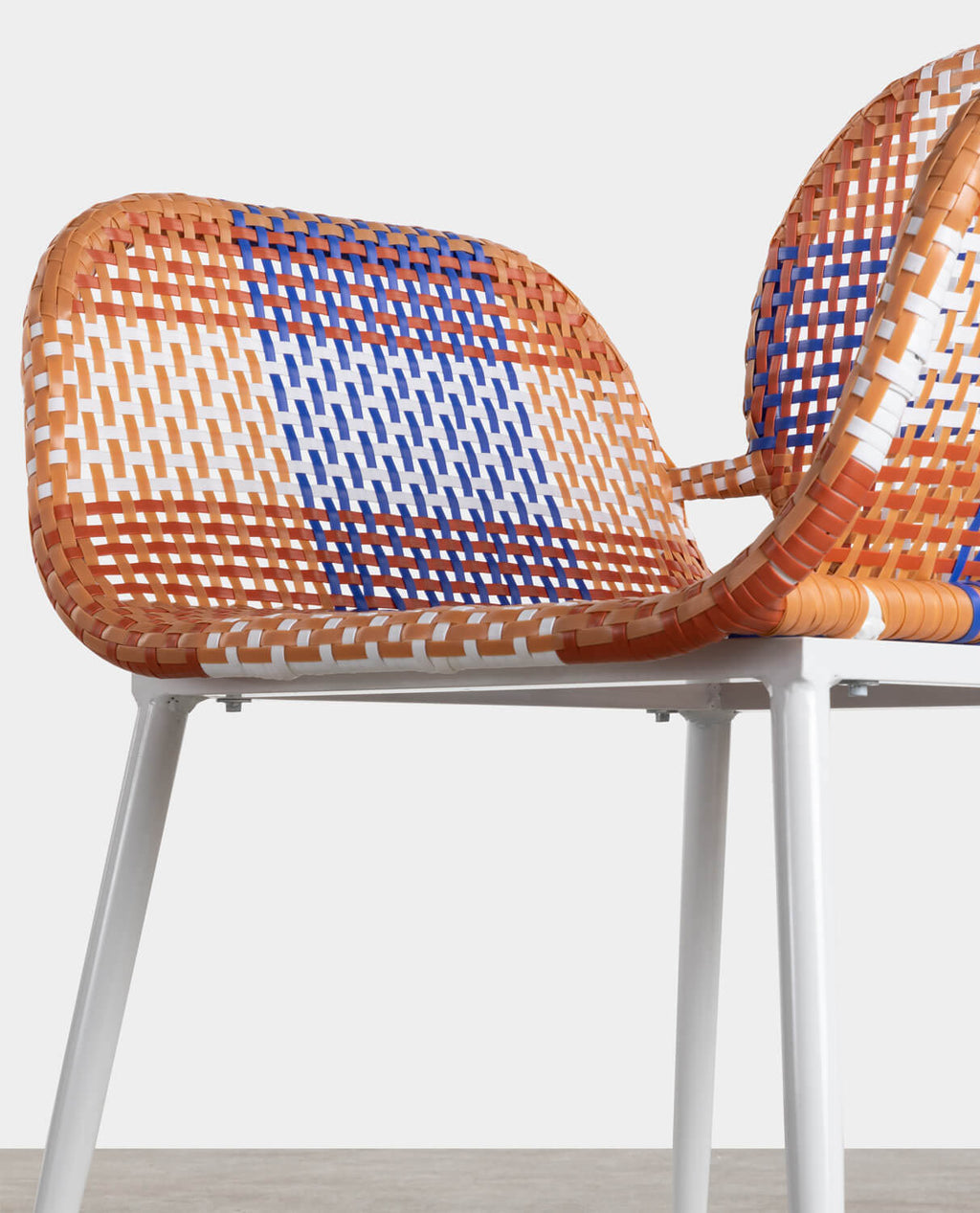 Emba Studio aluminum and synthetic rattan armchair