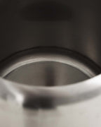 Larlysha round metal planter
